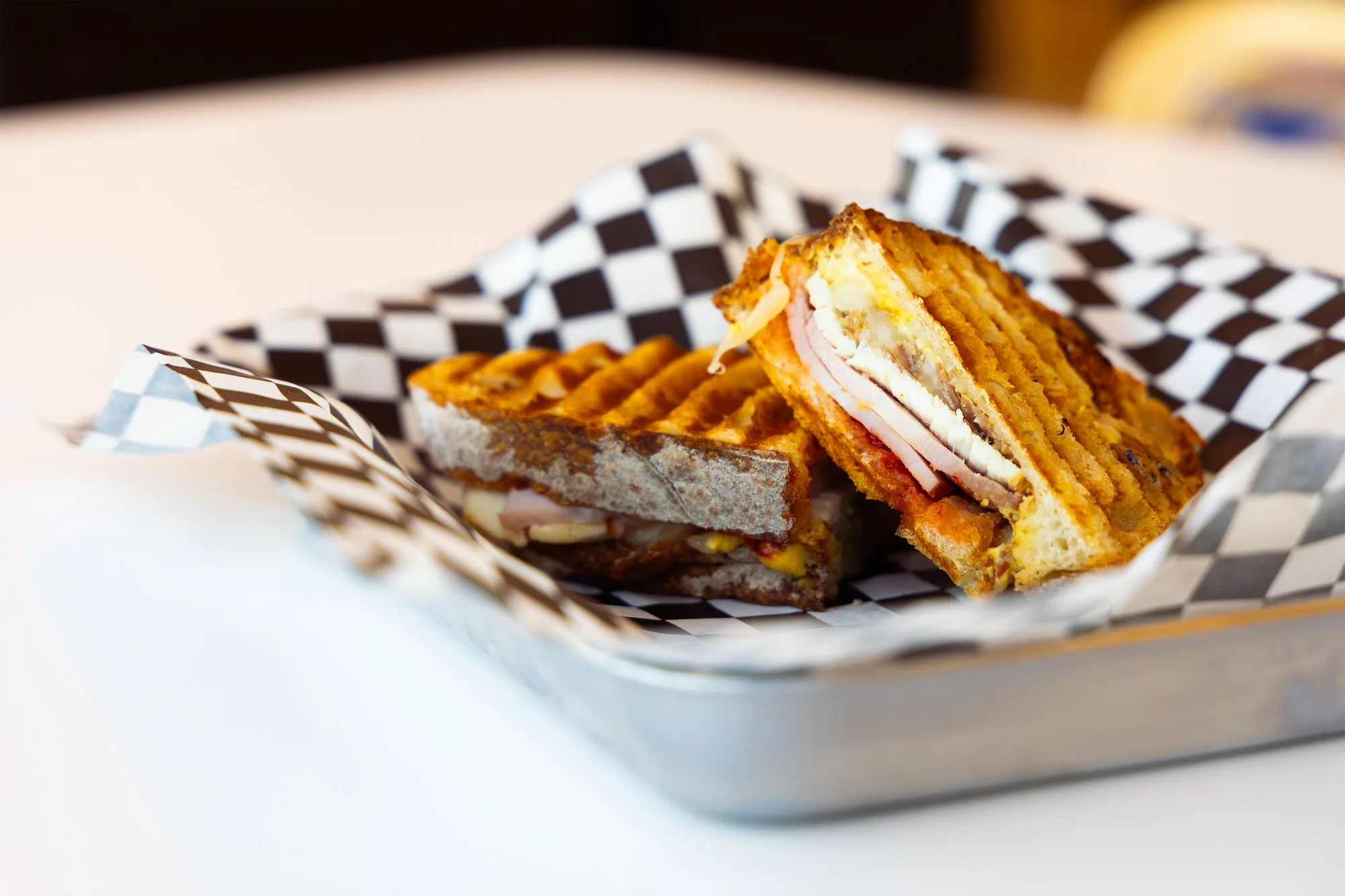 The “Hart-Par” panini is a specialty of the Kit Carson Café, named after the Hart-Parr tractor sitting in front of the restaurant.  Photo: Chas McCleary, Rocky Mountain PBS