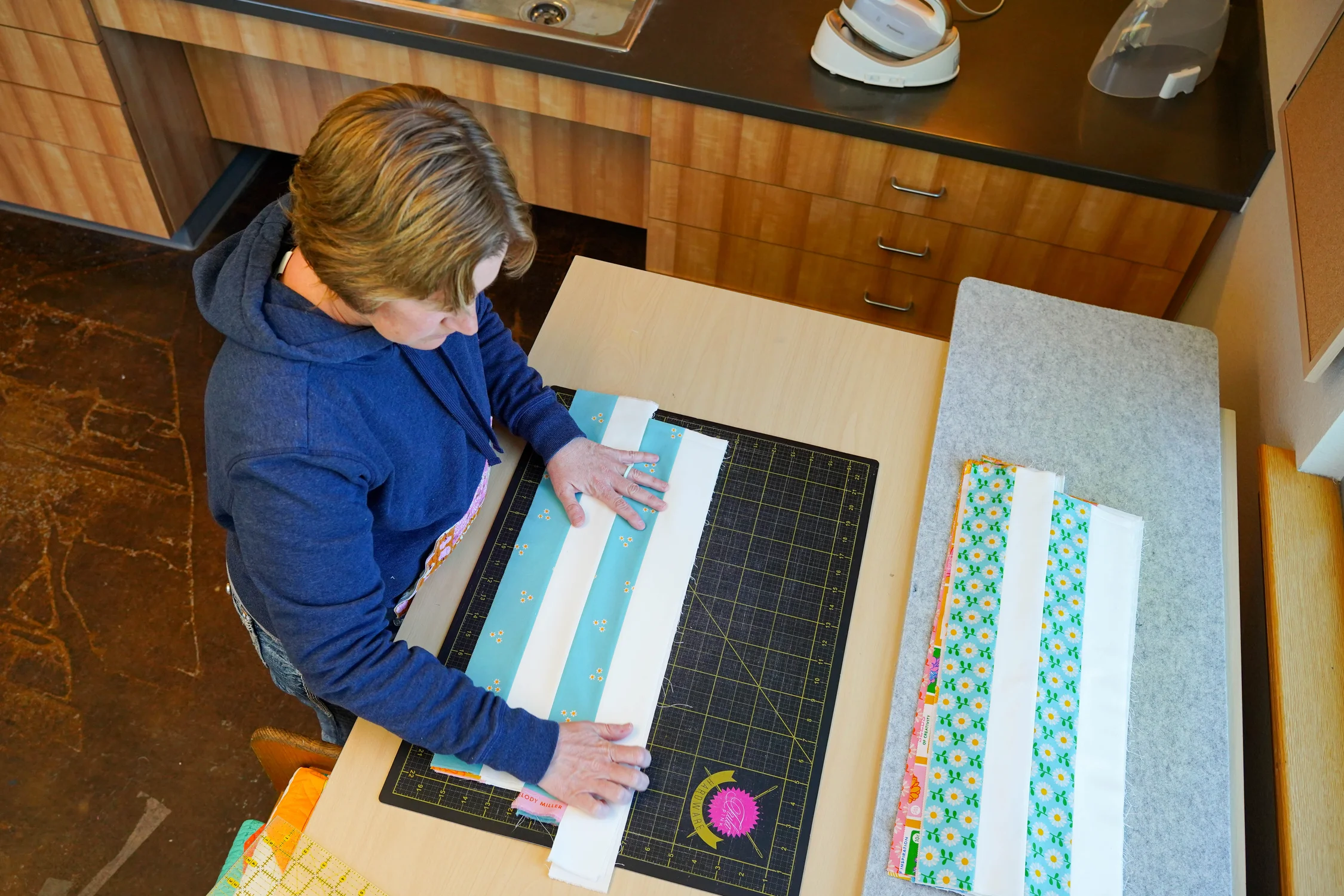 Powell works in the studio. Photo: Joshua Vorse, Rocky Mountain PBS