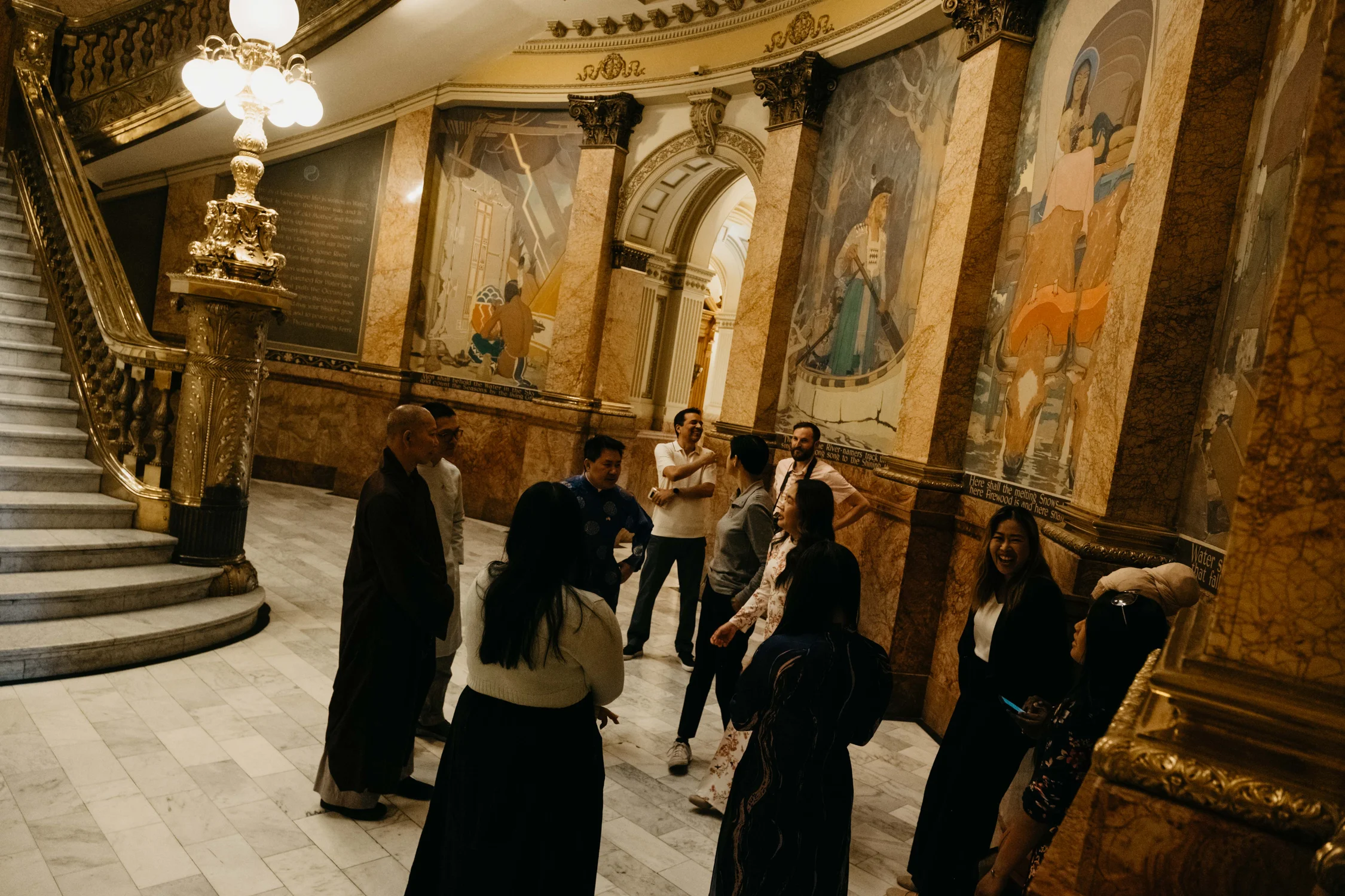 Members of Refugees + Immigrants United and other Vietnamese community members gather in the rotunda. Photo: Peter Vo, Rocky Mountain PBS