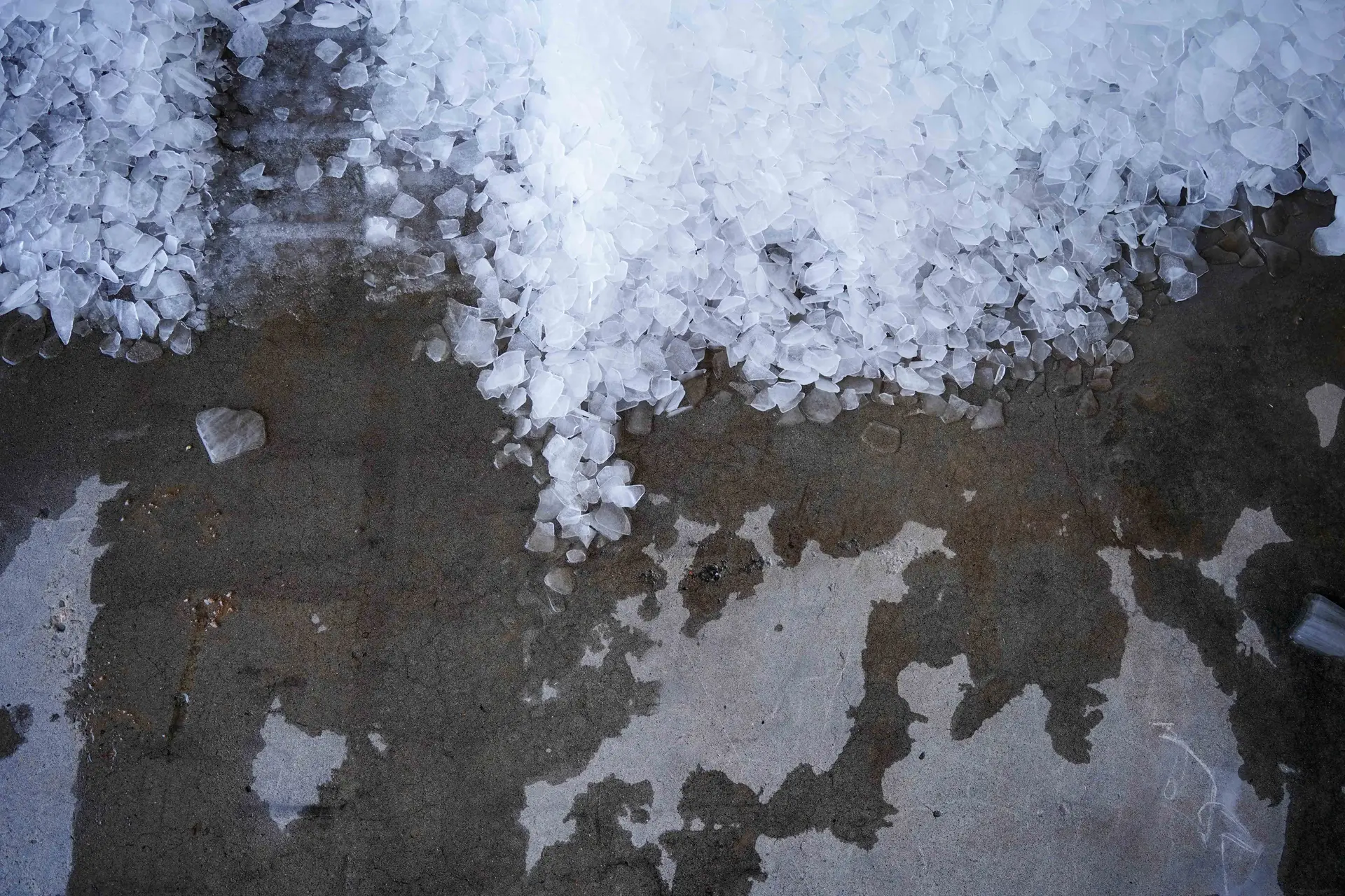 Piles of ice sit on the side of the packing shed, waiting to be scooped up and packed into pallets of sweet corn. Photo: Joshua Vorse, Rocky Mountain PBS