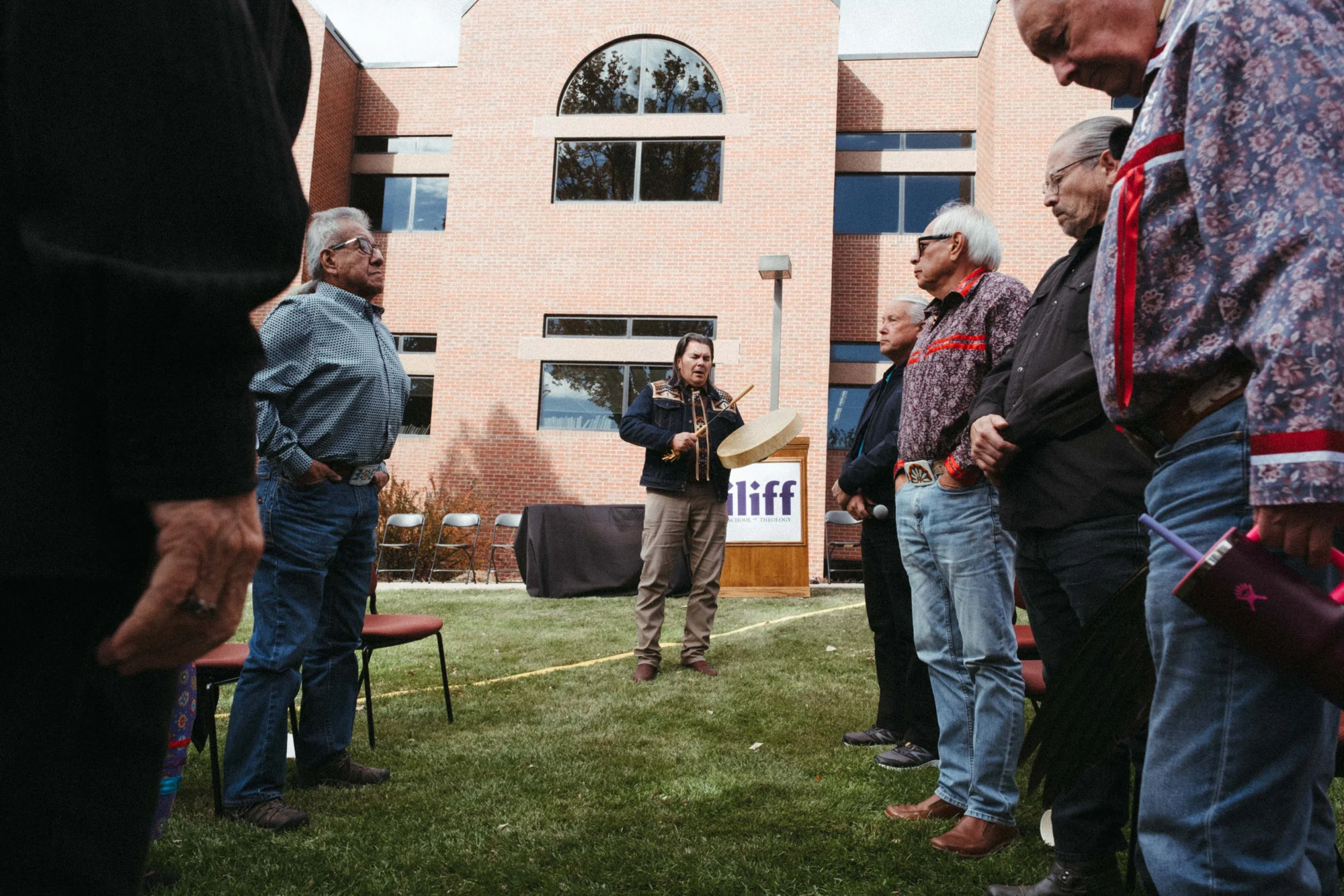 Curtis Zunigha, Lenape elder and historian, performs a Lenape song at a ground blessing ceremony at the Iliff School of Theology. Photo: Peter Vo, Rocky Mountain PBS