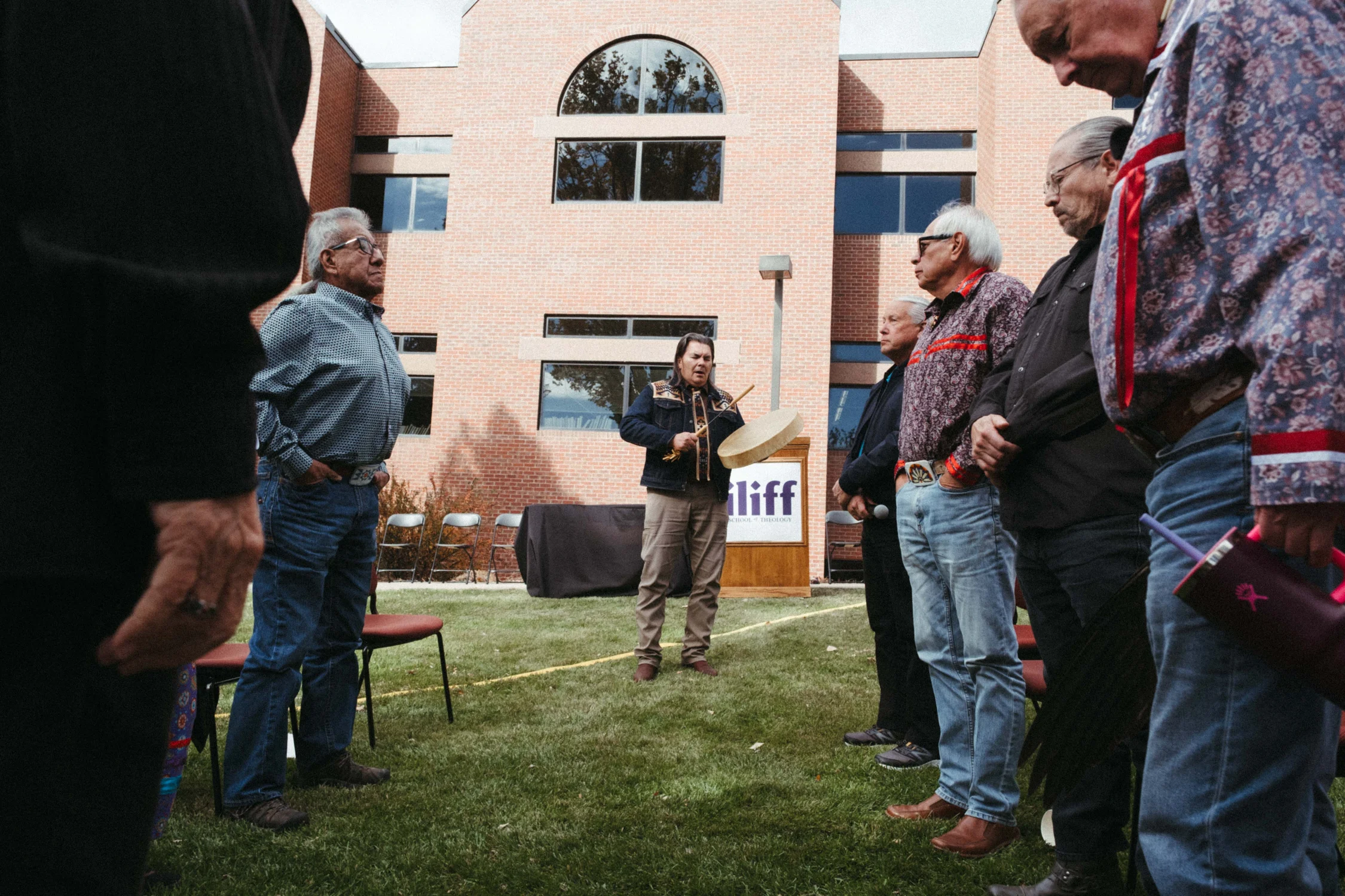 Curtis Zunigha, Lenape elder and historian, performs a Lenape song at a ground blessing ceremony at the Iliff School of Theology. Photo: Peter Vo, Rocky Mountain PBS
