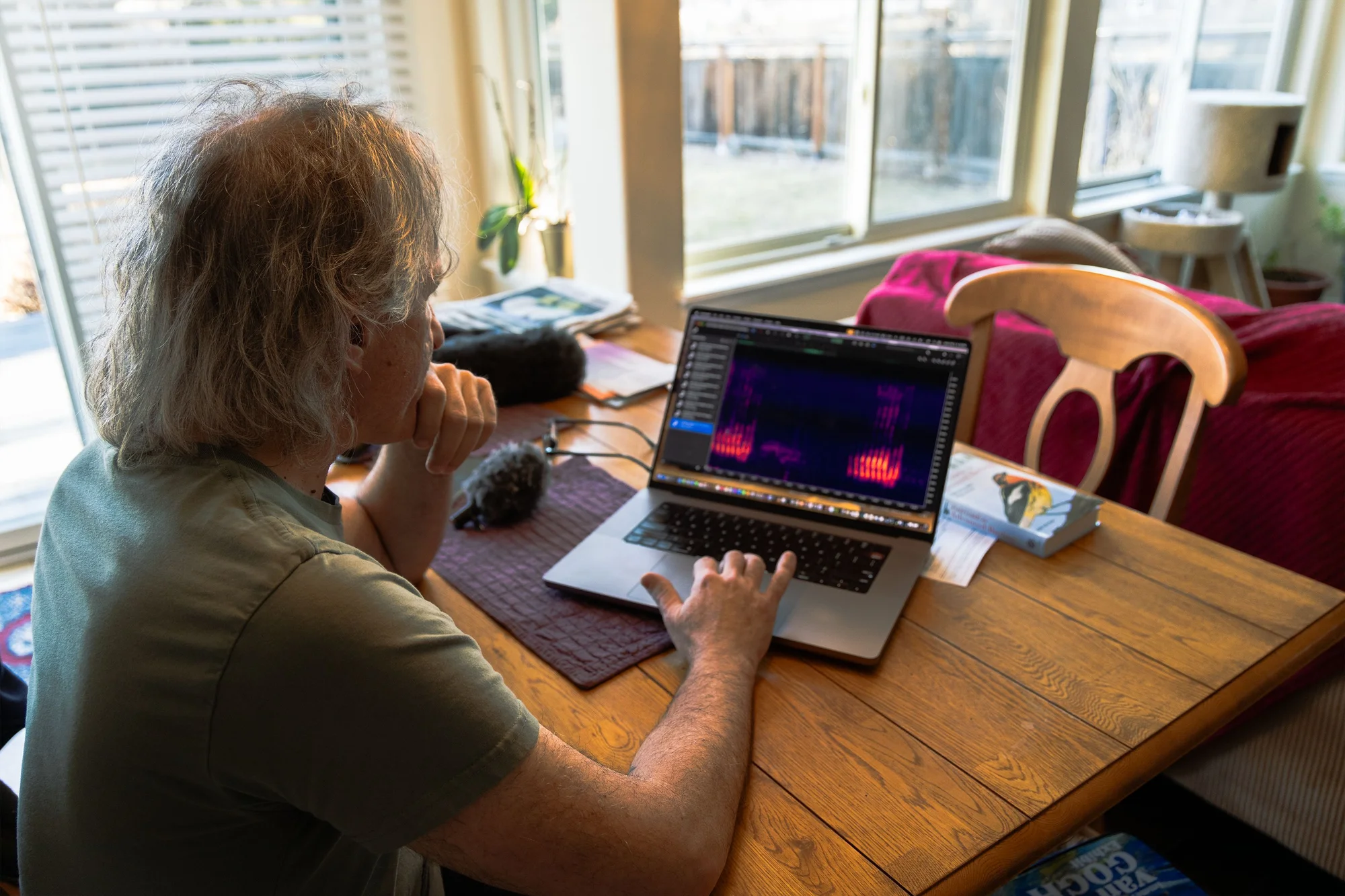 DeFonso uses audio editing software to clean-up bird recordings before uploading online. Photo: Chase McCleary, Rocky Mountain PBS