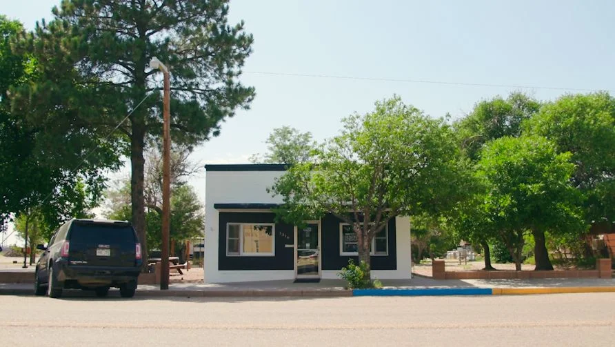 The Kiowa County Independent draws passersby walking along Eads’ main street. Photo: Chase McCleary, Rocky Mountain PBS