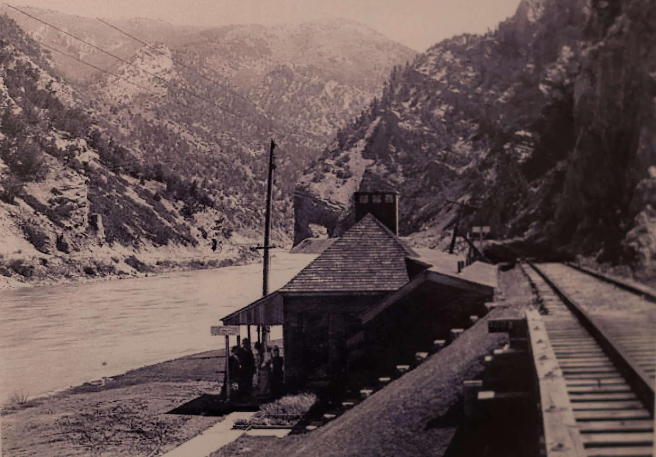 An undated photo hanging in the hall at Yampah Spa shows the old Cave No. 1 building and entrance, right next to the railroad tracks on the southern side of the Colorado River. Photo courtesy Yampah Spa and Vapor Caves