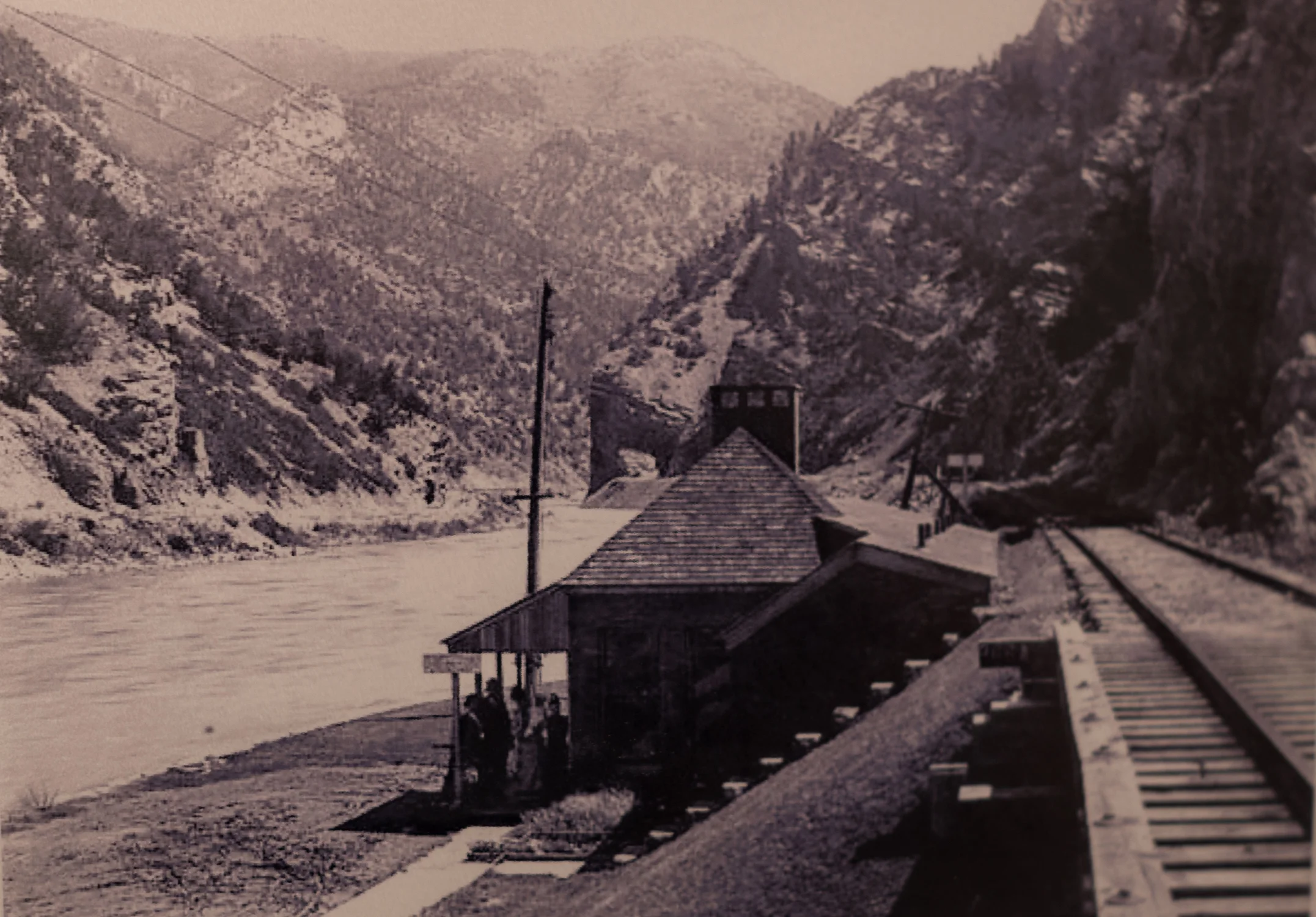 An undated photo hanging in the hall at Yampah Spa shows the old Cave No. 1 building and entrance, right next to the railroad tracks on the southern side of the Colorado River. Photo courtesy Yampah Spa and Vapor Caves