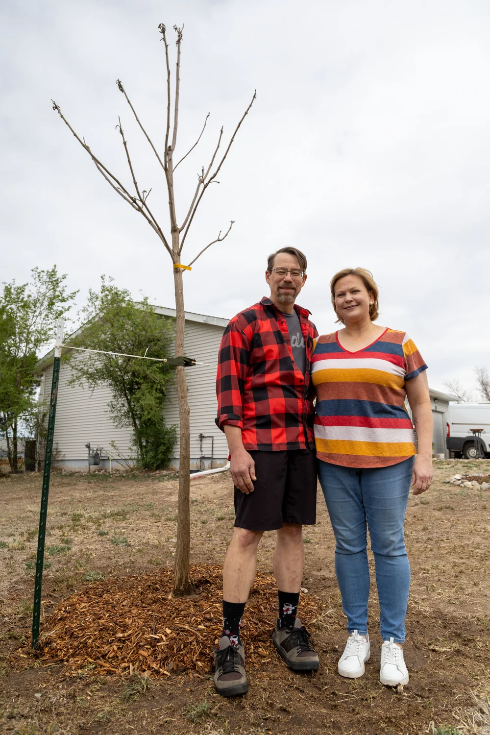 Ann and Kenneth Vasseur have been wanting to add more trees to their yard since they moved in. Photo: Chelsea Casabona, Rocky Mountain PBS