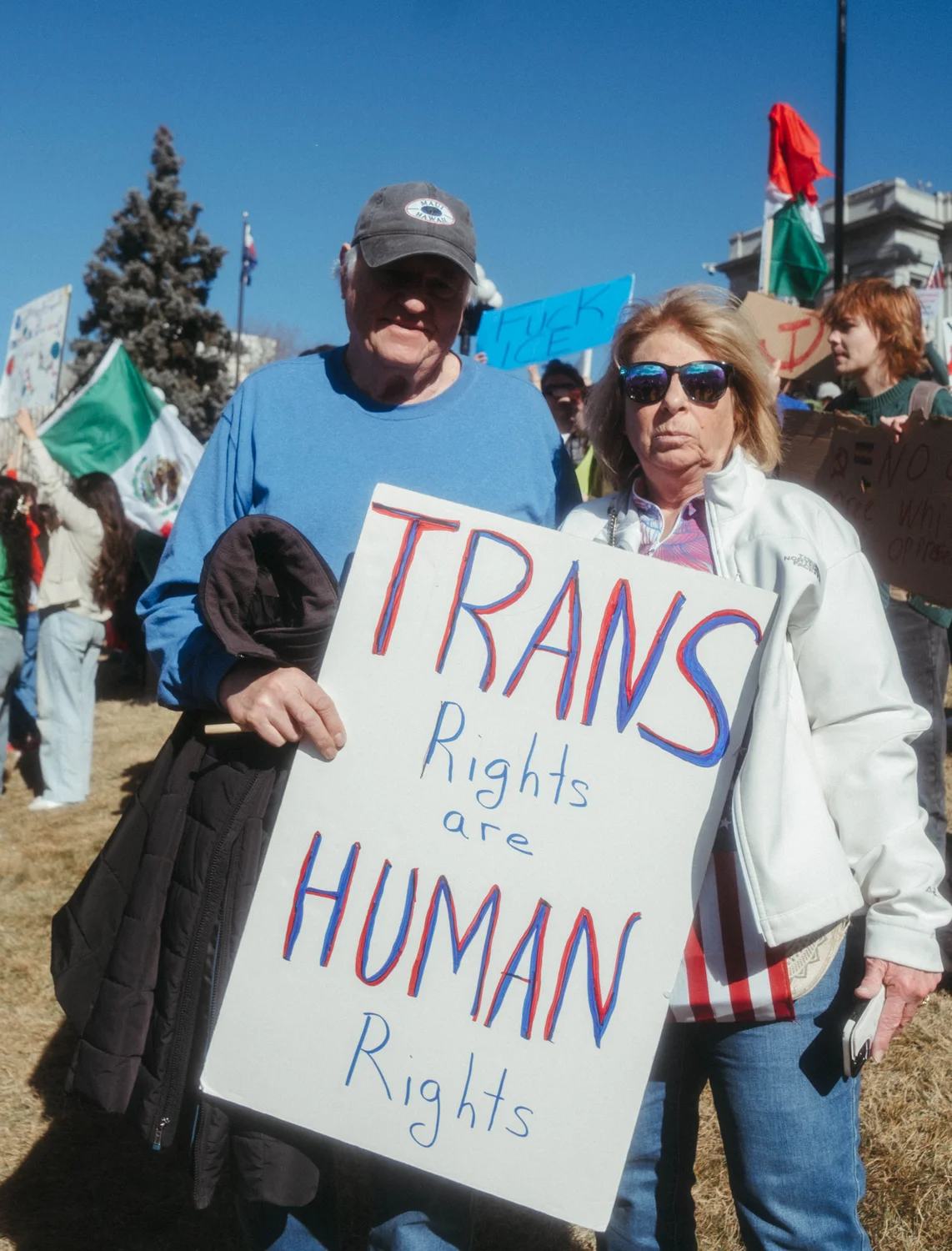 Ron and Carol Earl attended a nationwide protest in support of their 22-year-old transgender daughter. The couple said their daughter was unable to change her federal identification to match her identity and they attended the protest to support her and other transgender people. Photo: Peter Vo, Rocky Mountain PBS