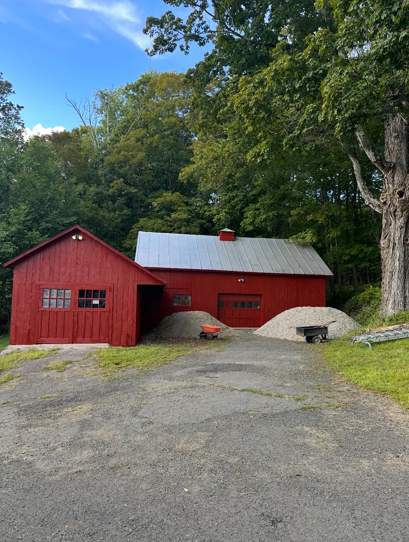 After — Red barn and workshop before and after restoration