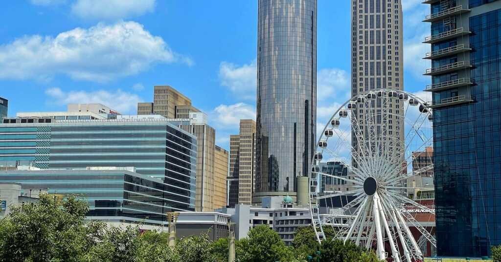 Downtown Atlanta with a ferris wheel in the foreground