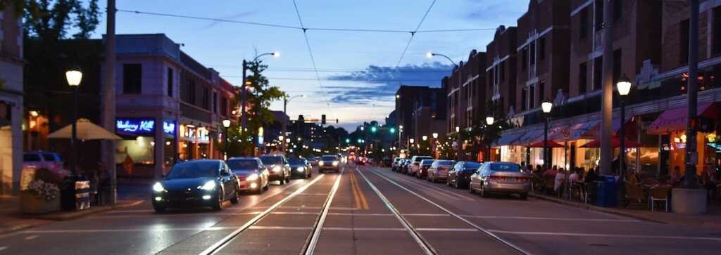 Cars parked in front of multifamily housing in St Louis at night