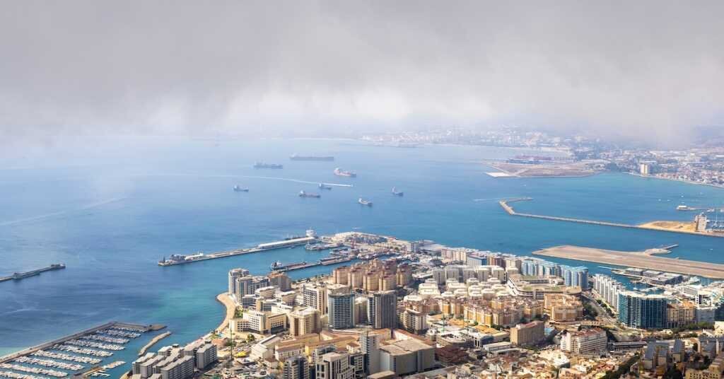 a foggy port city with industrial, retail, and office land zoning