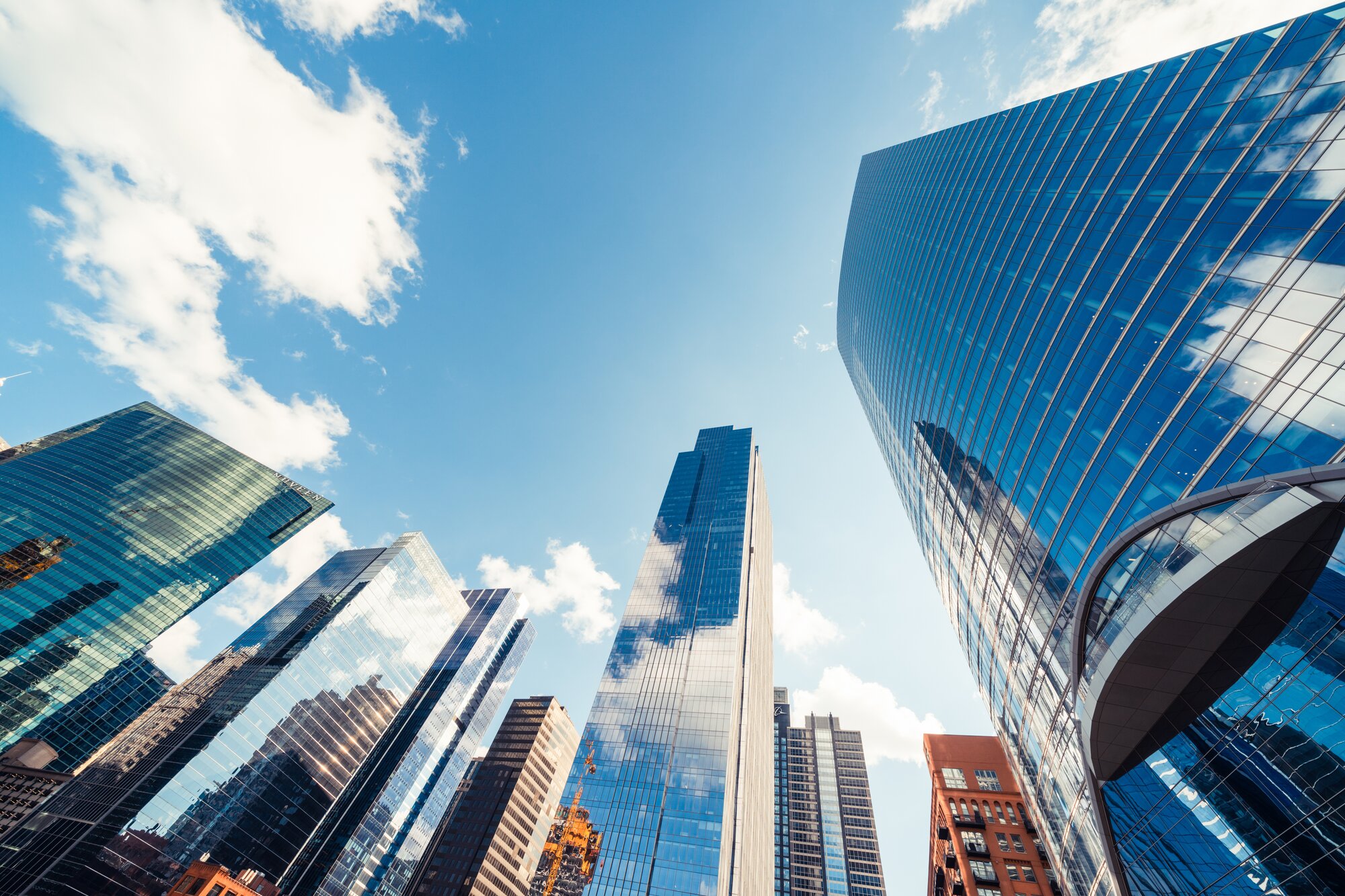 Commercial real estate buildings stretch up to the sky and can be sold and reinvested in via a 1031 Exchange