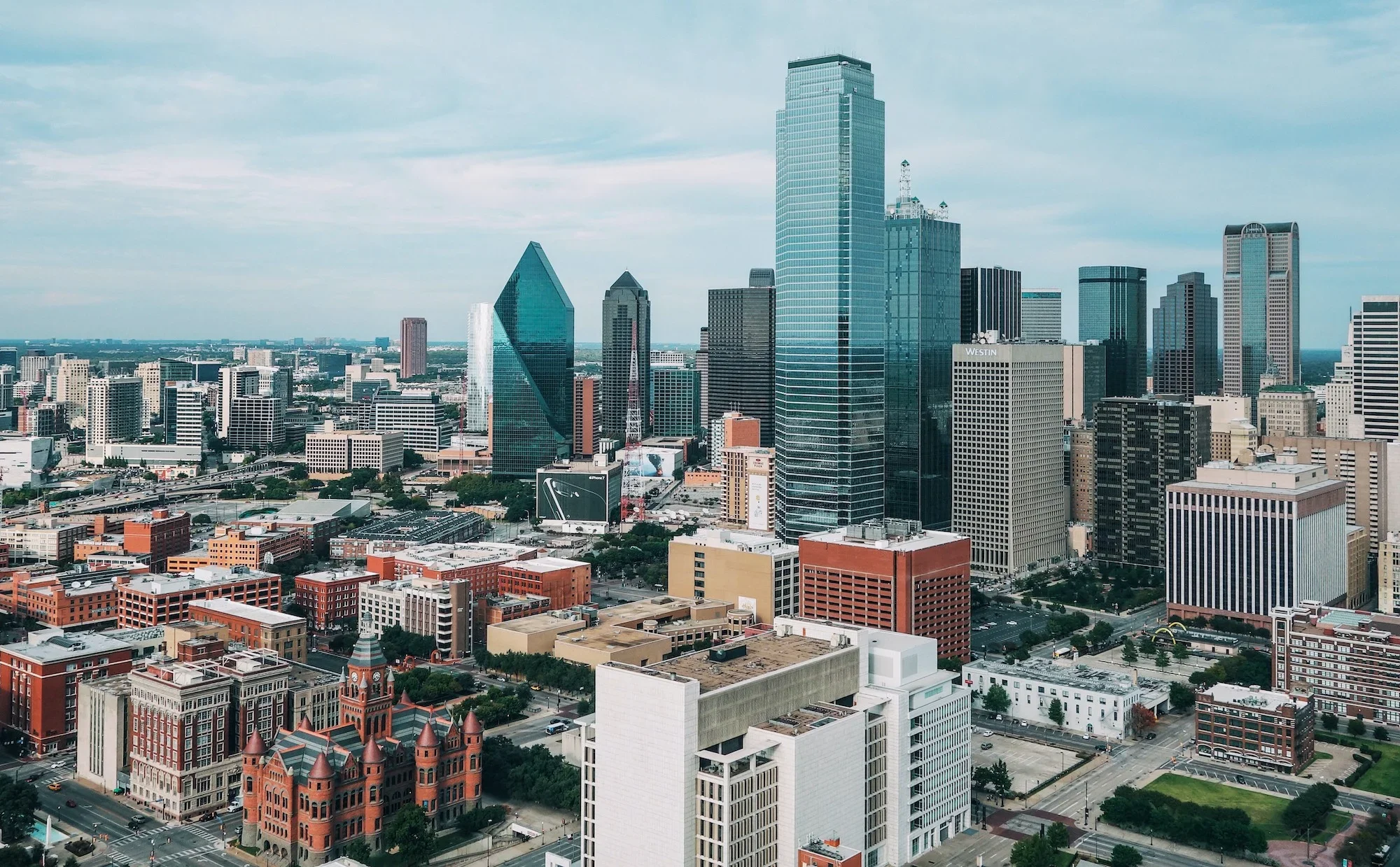 The cityscape of Dallas, TX with its downtown skyline