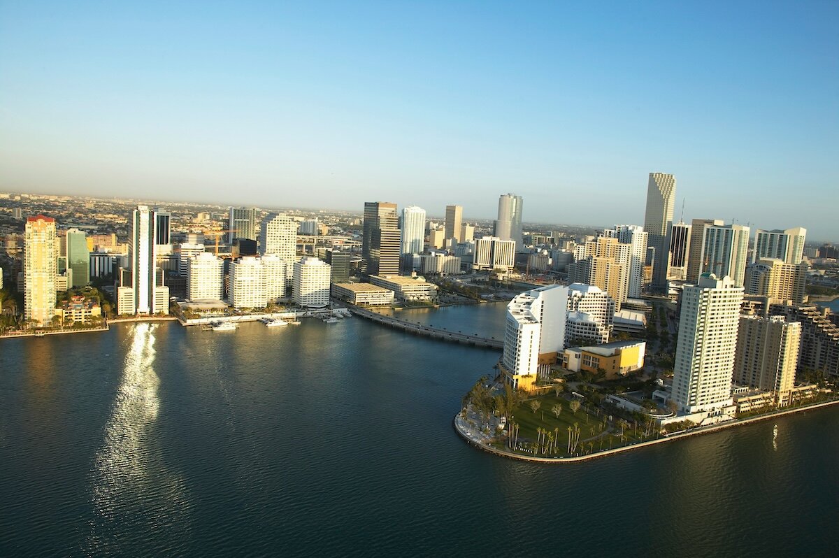 The city of Miami's downtown coast line with ports and tall buildings