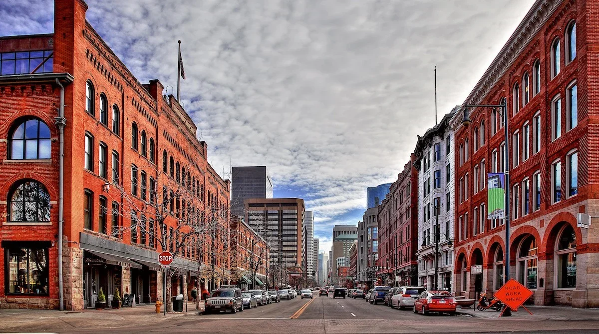 Downtown Denver with orange buildings lining the street