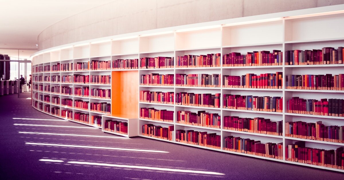 a sunset-light-filled library full of research documents, references, and comparables