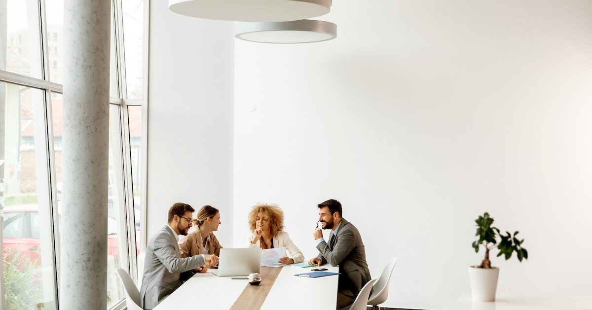 a team of brokers connecting on prospecting strategies