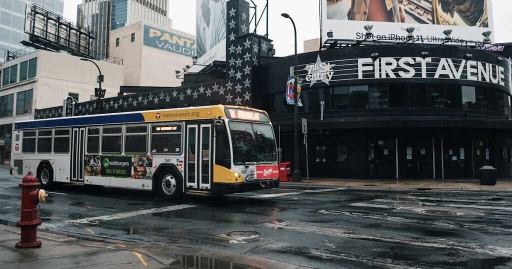 A bus shuttles around residents on a downtown block in Minneapolis