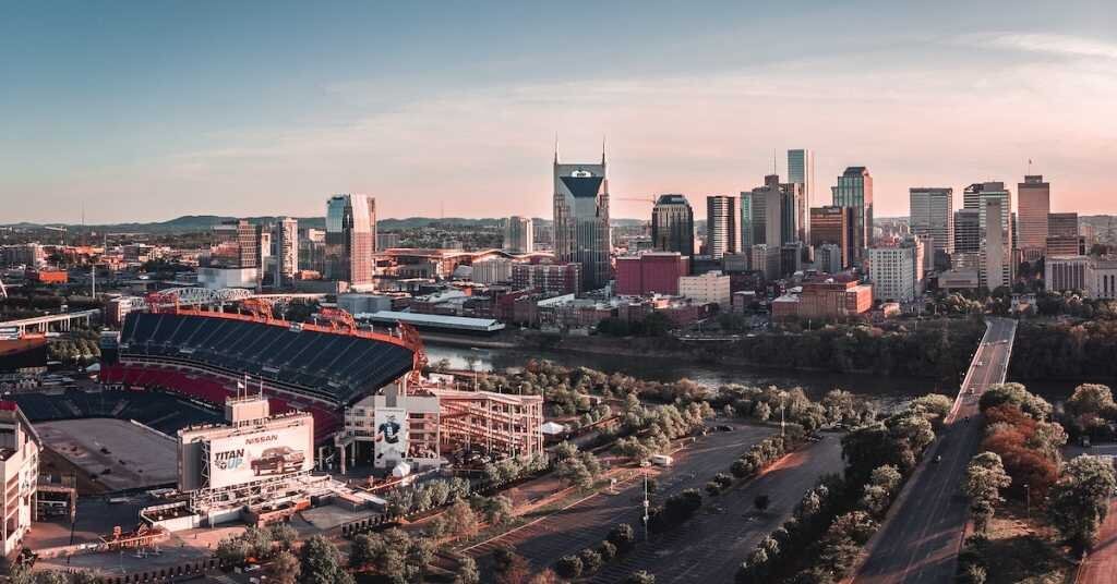A sunset view of downtown Nashville from the east side of the river.