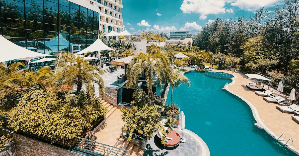 the outdoor pools of a resort hotel