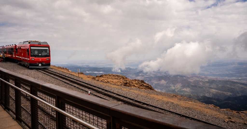 A train rides through the Colorado mountains