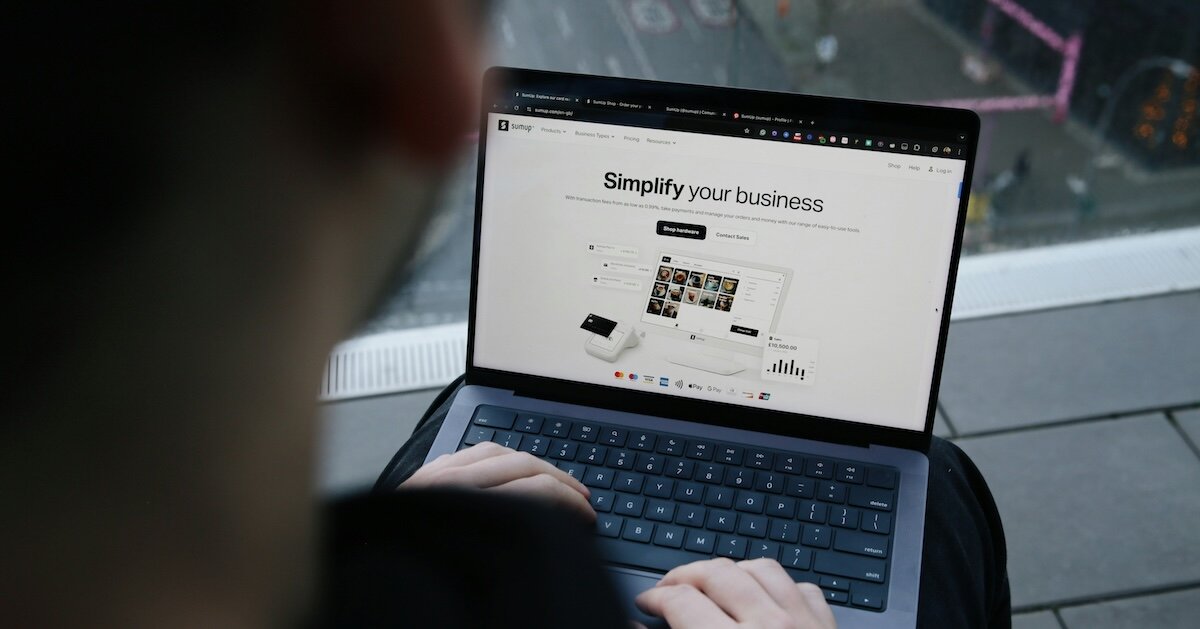 a person working on a laptop website