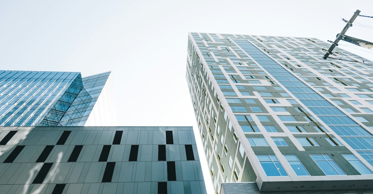 Office buildings stretching up to the sky - offices are making a comeback, among other H2 commercial real estate trends