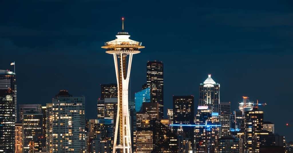 The space needle lit up at night