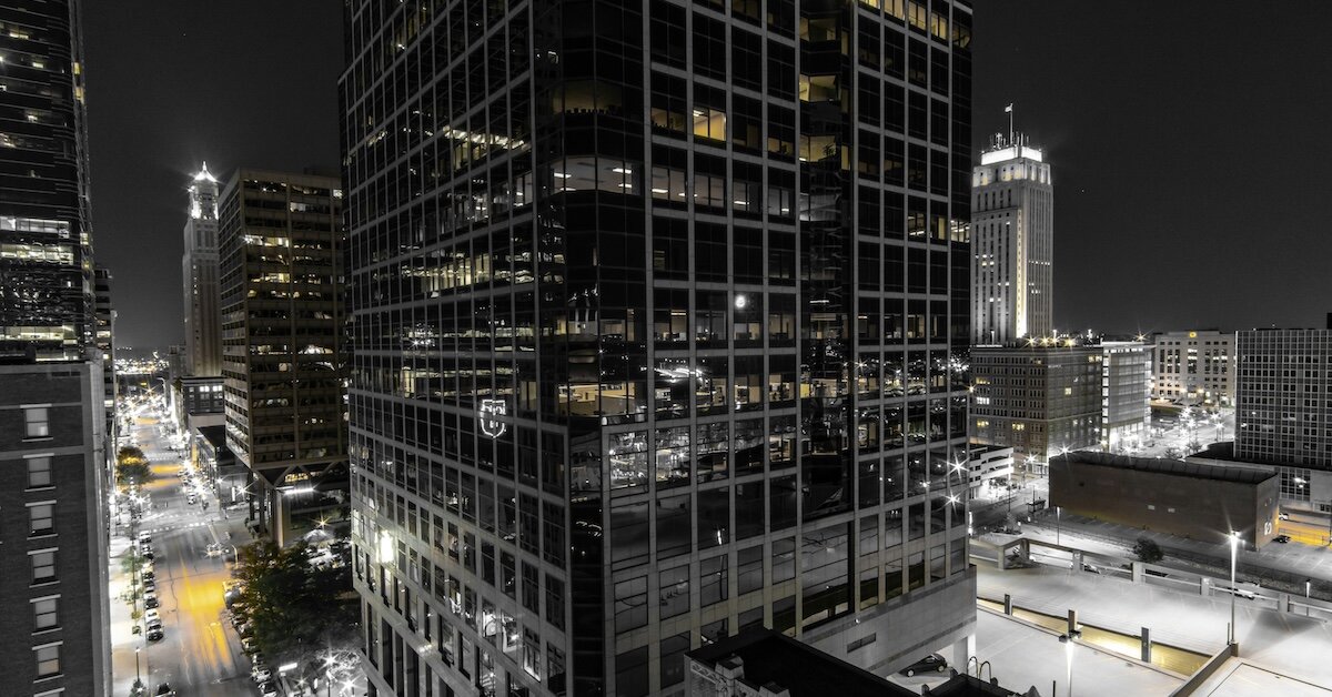 A black and white photo of downtown Kansas City at night