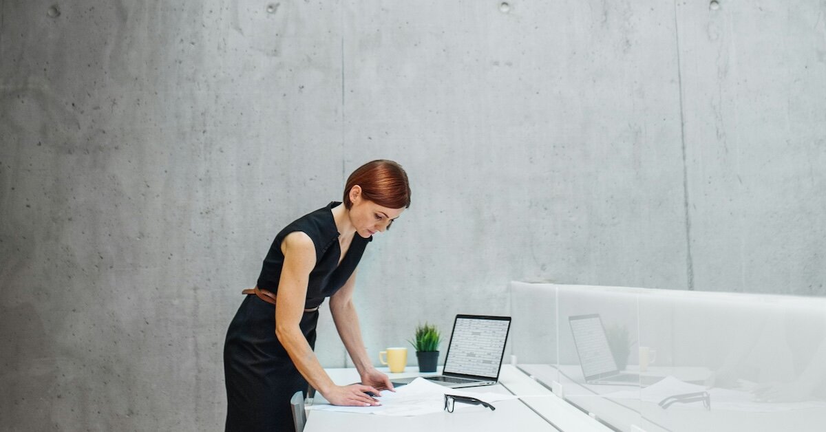 a broker doing research while taking a break in her office