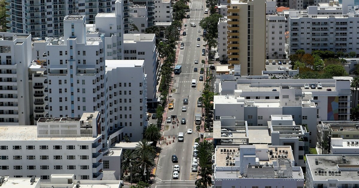 A top-of-building view of a busy metropolitan street in the city