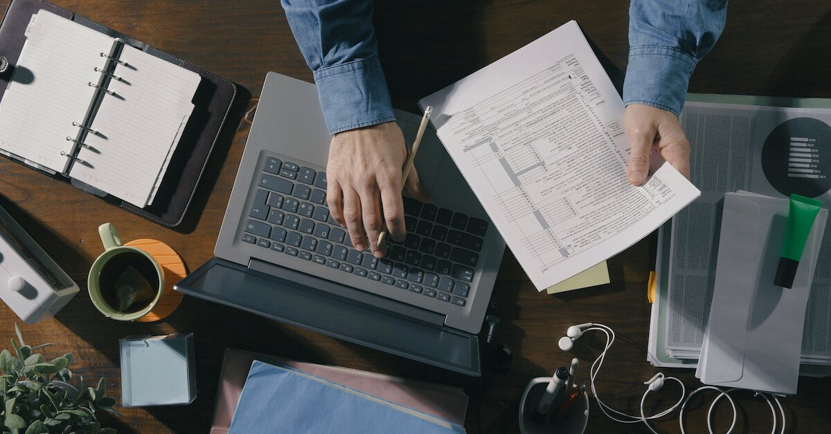 A man entering tax information into his computer
