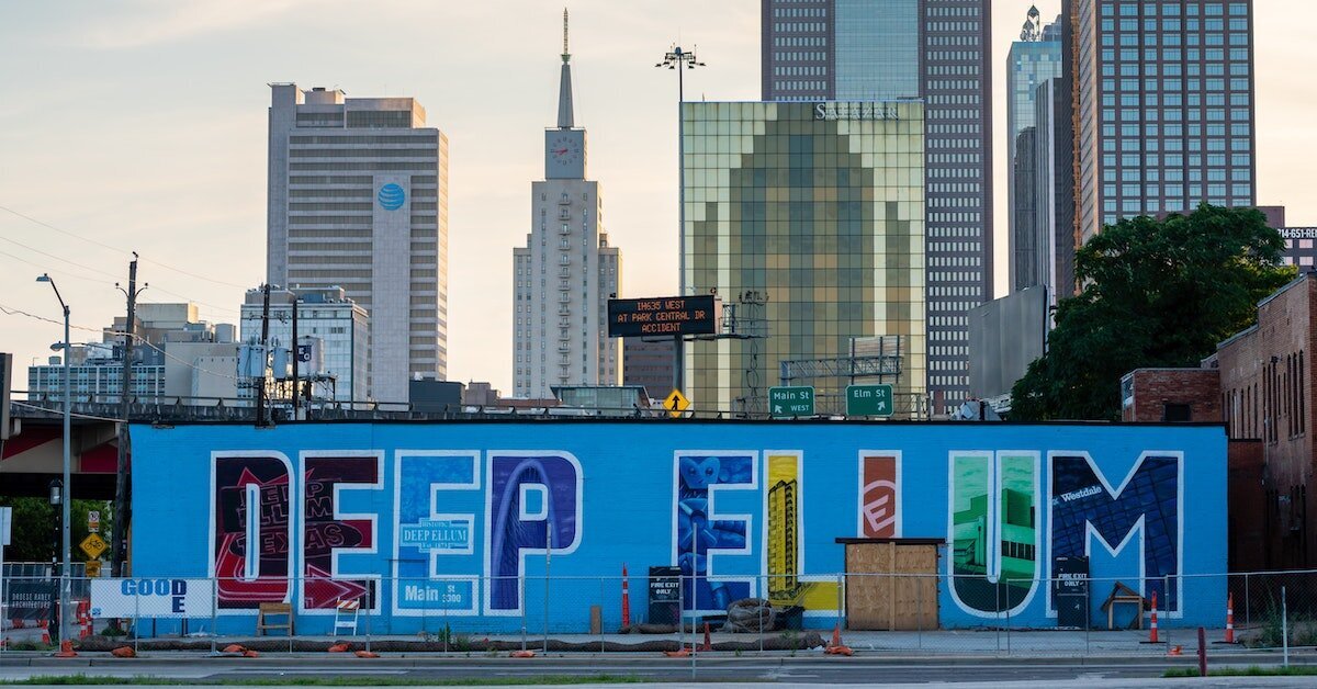 A grafitti sign saying "Deep Ellum" in Dallas