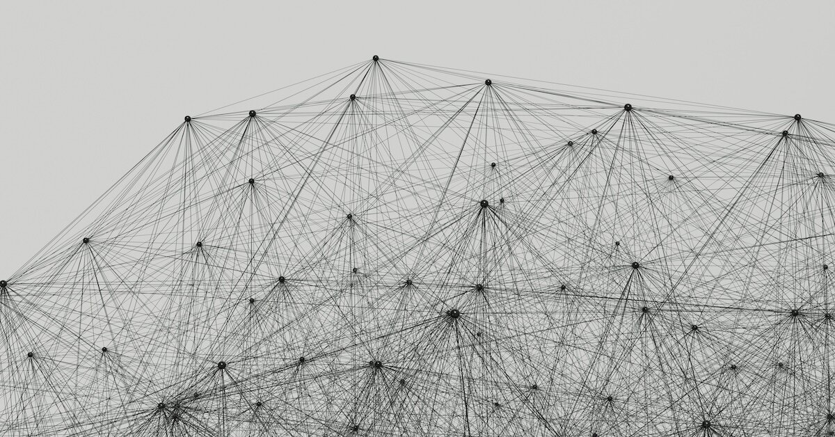 A series of points connected by various lines that form triangle shapes and webs