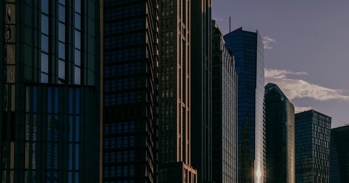 A dark row of CRE buildings