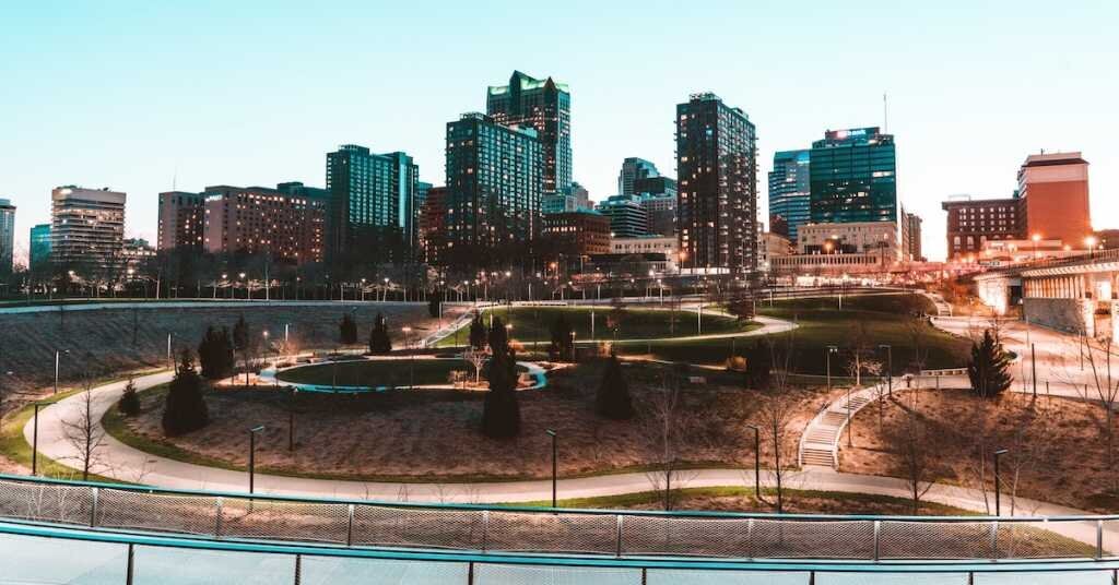 Downtown St. Louis Missouri at night, with a streetlamp-lit park in the foreground