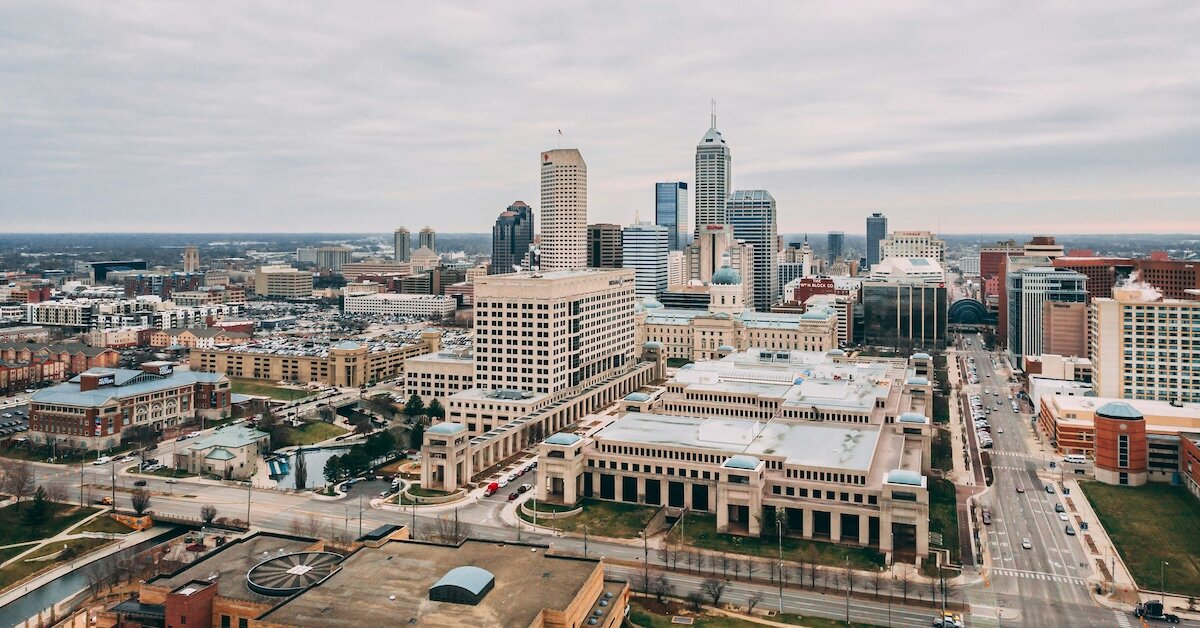 The cityscape of Indianapolis, IN, with its downtown skyline