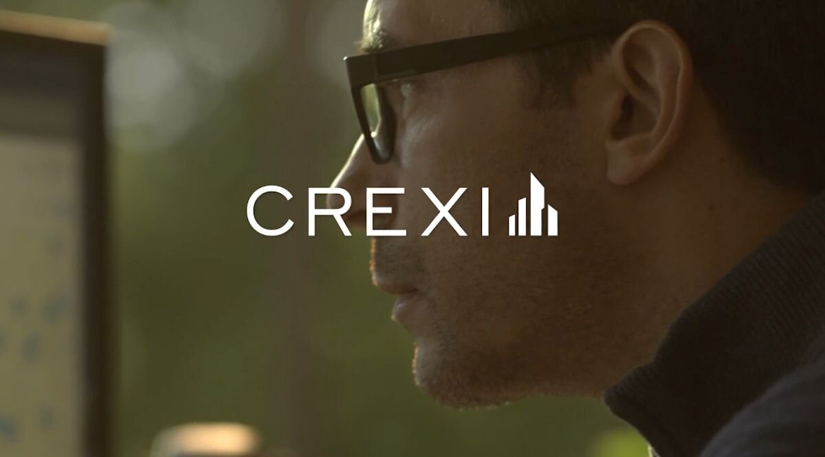 Crexi logo over man with glasses face