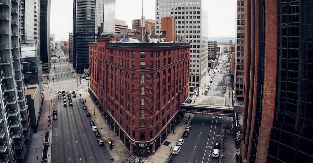 A corner building photographed at an odd angle in a Colorado city