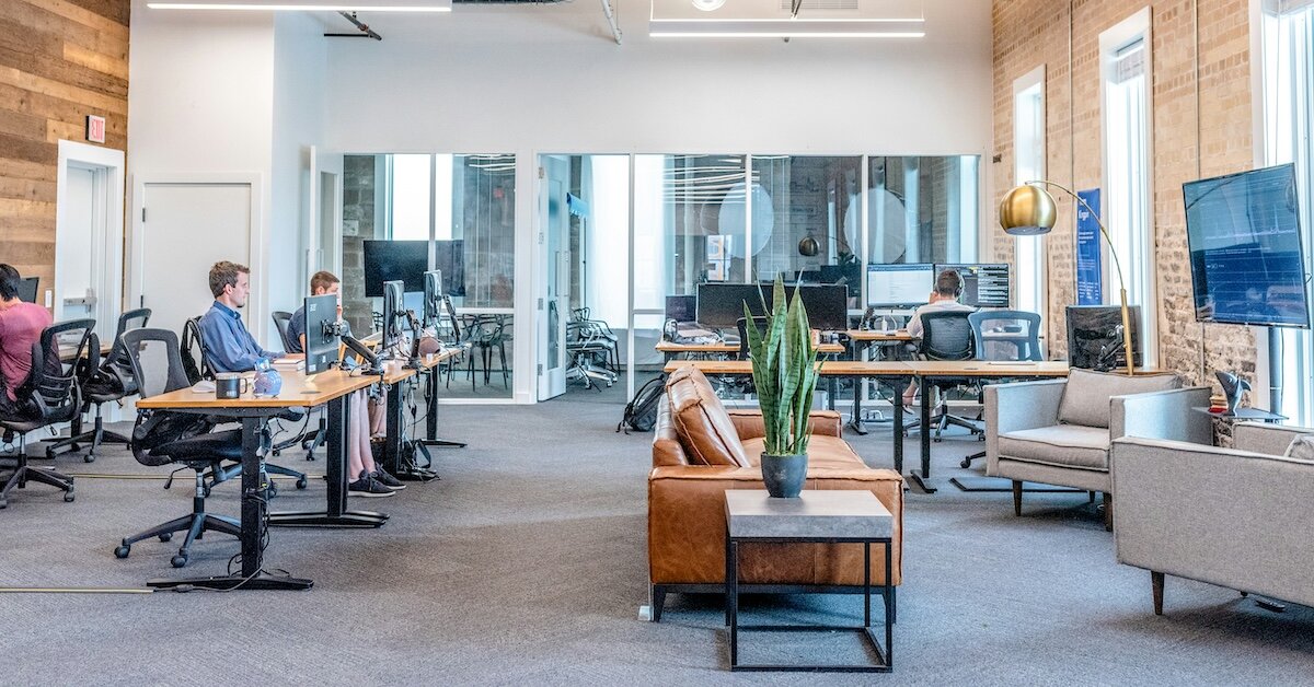the inside of a trendy occupied office
