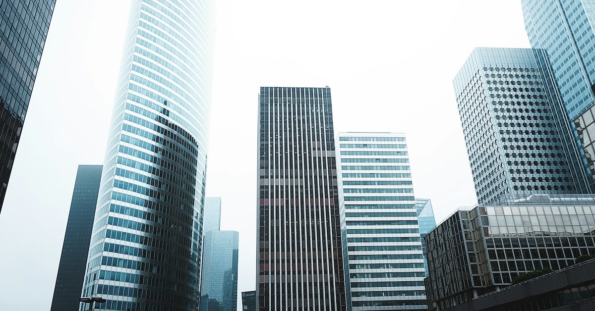A fog covers several commercial real estate office buildings in NYC