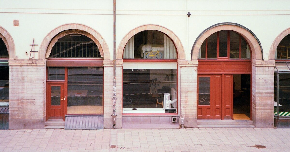 looking through the window of a retail space under renovation and being converted
