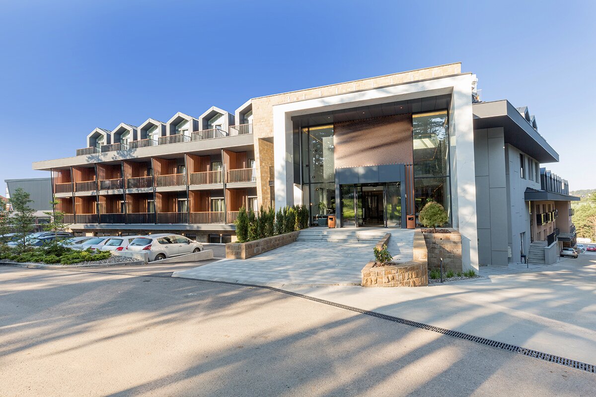 Looking at a hotel from the entrance outside
