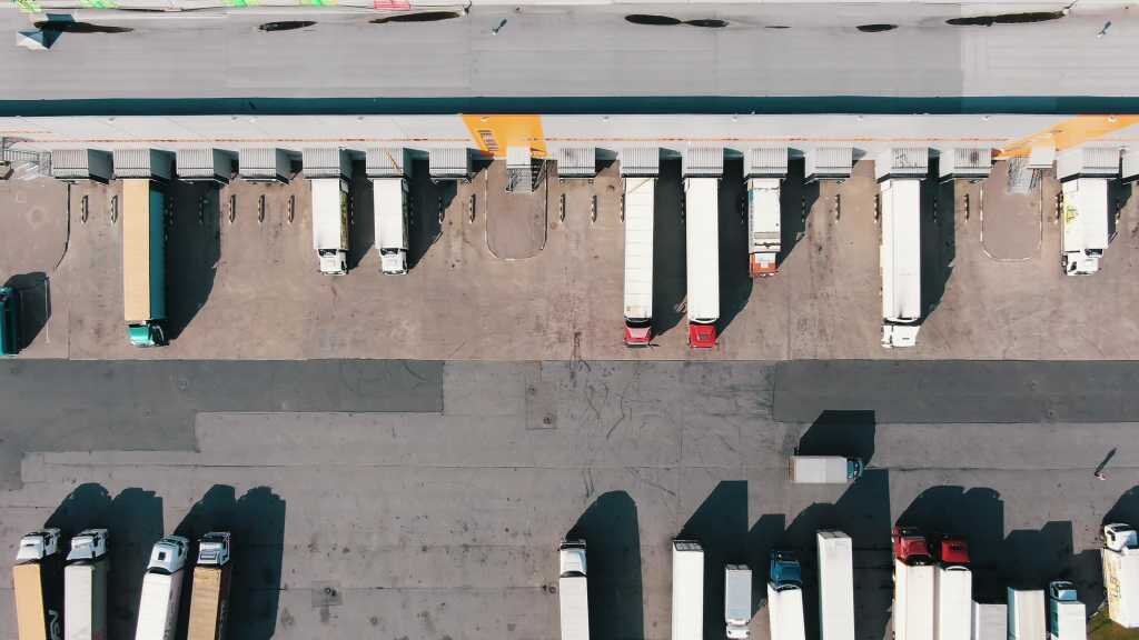 overhead shot of a truck loading bay at an industrial warehouse