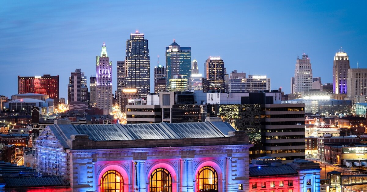 Kansas City, Missouri, at night with historic construction in the foreground.