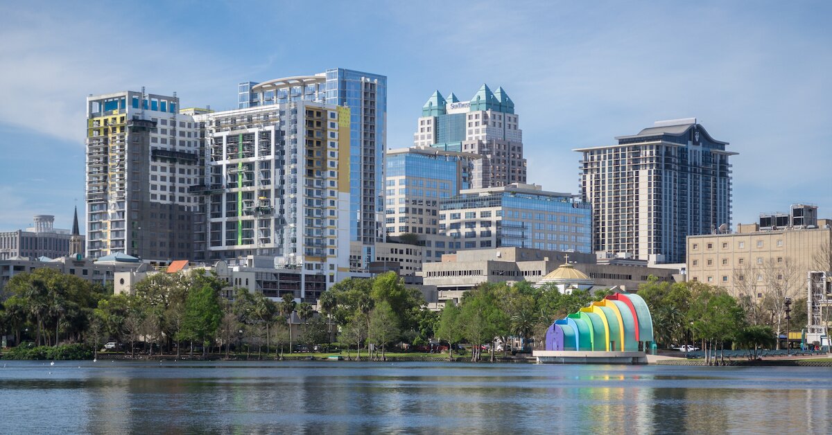 Orlando, Florida with a rainbow-colored bandshell in the foreground