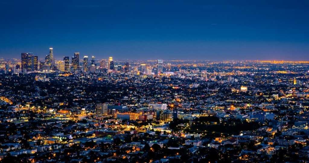  A view of the city of Los Angeles at night, with downtown's office towers visible
