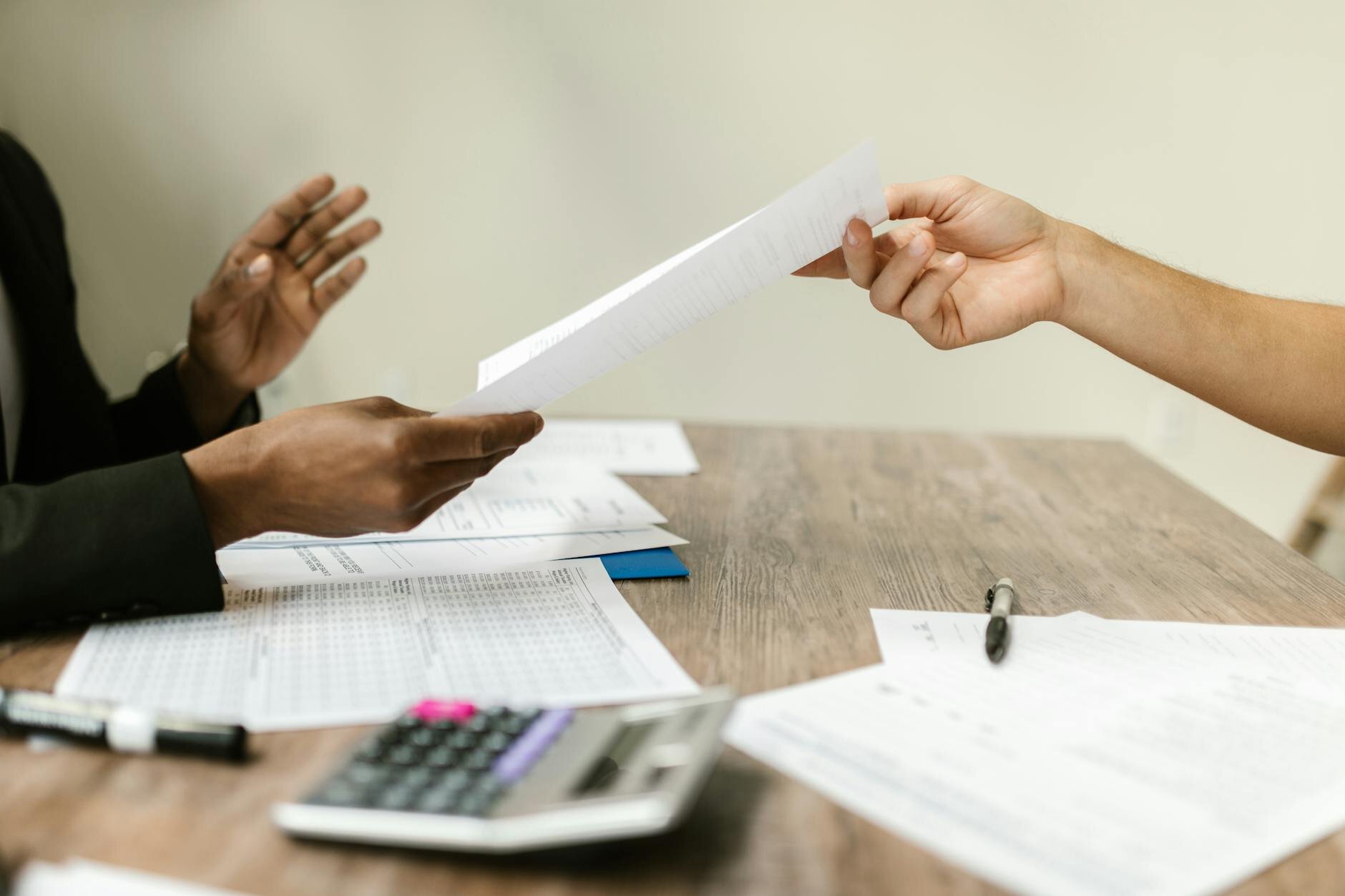 two people exchanging data and information for a deal