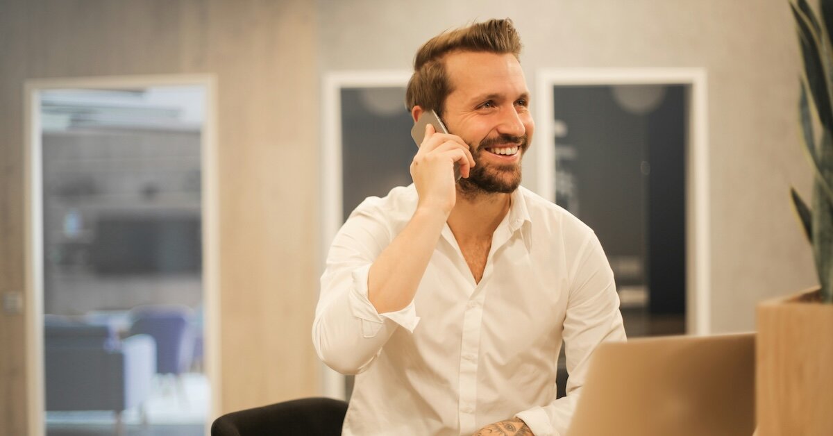 a person on the phone with a CRE prospect